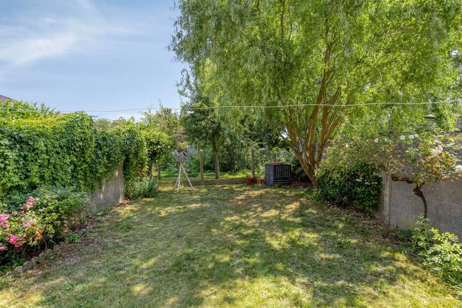 Ruime 2-gevelwoning met tuin en mogelijks 4 slaapkamers foto 2