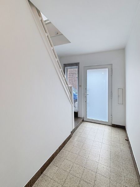 Knusse rijwoning foto 2