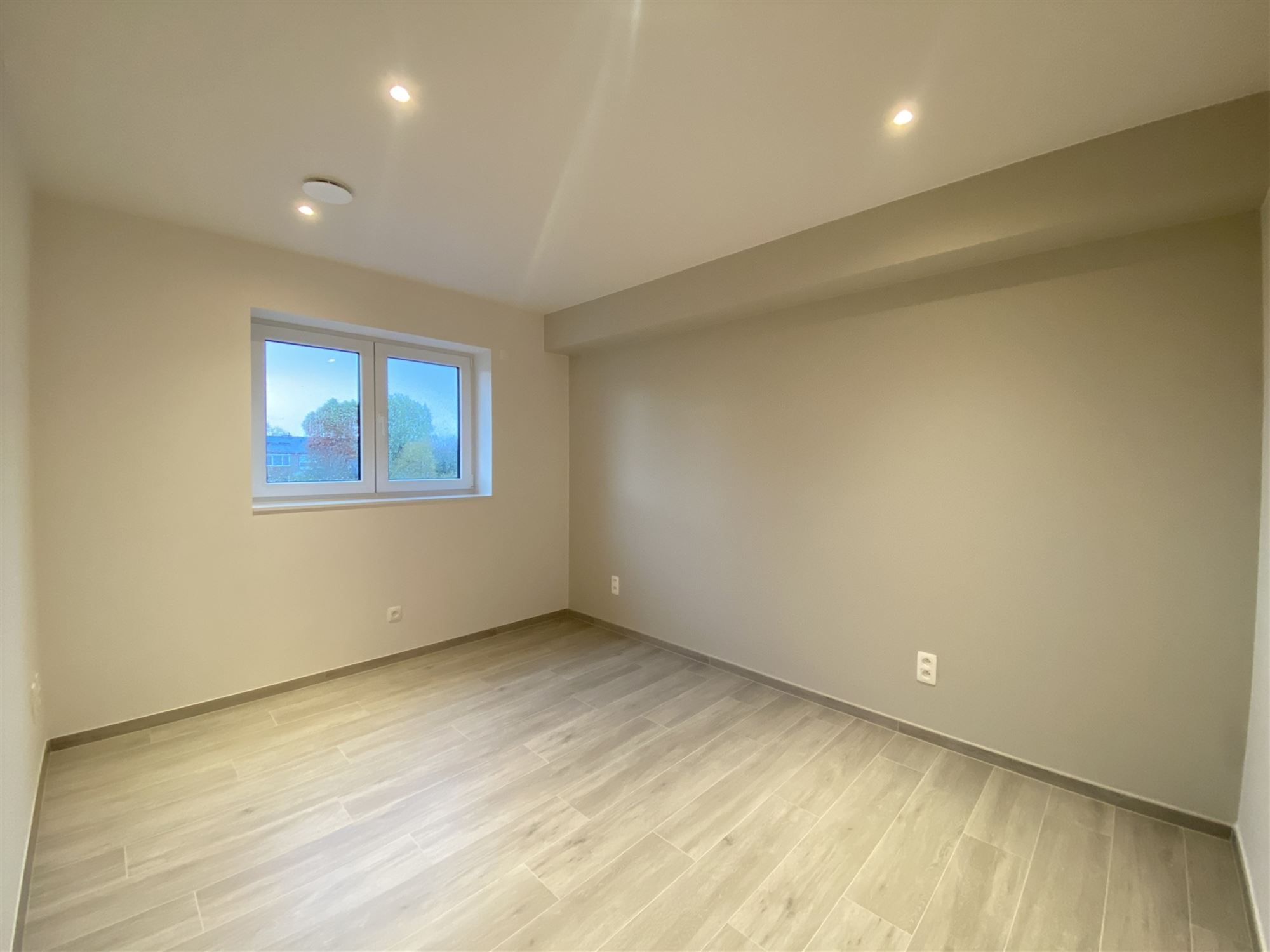 Nieuwbouwwoning te Kluizen met optimale ruimteverdeling en hedendaagse afwerking foto 17