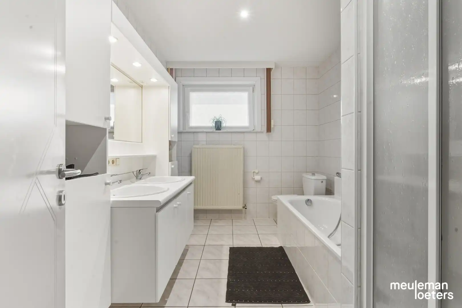 Schitterend gelegen en energiezuinige gelijkvloerse woning met tuin en garage foto 7