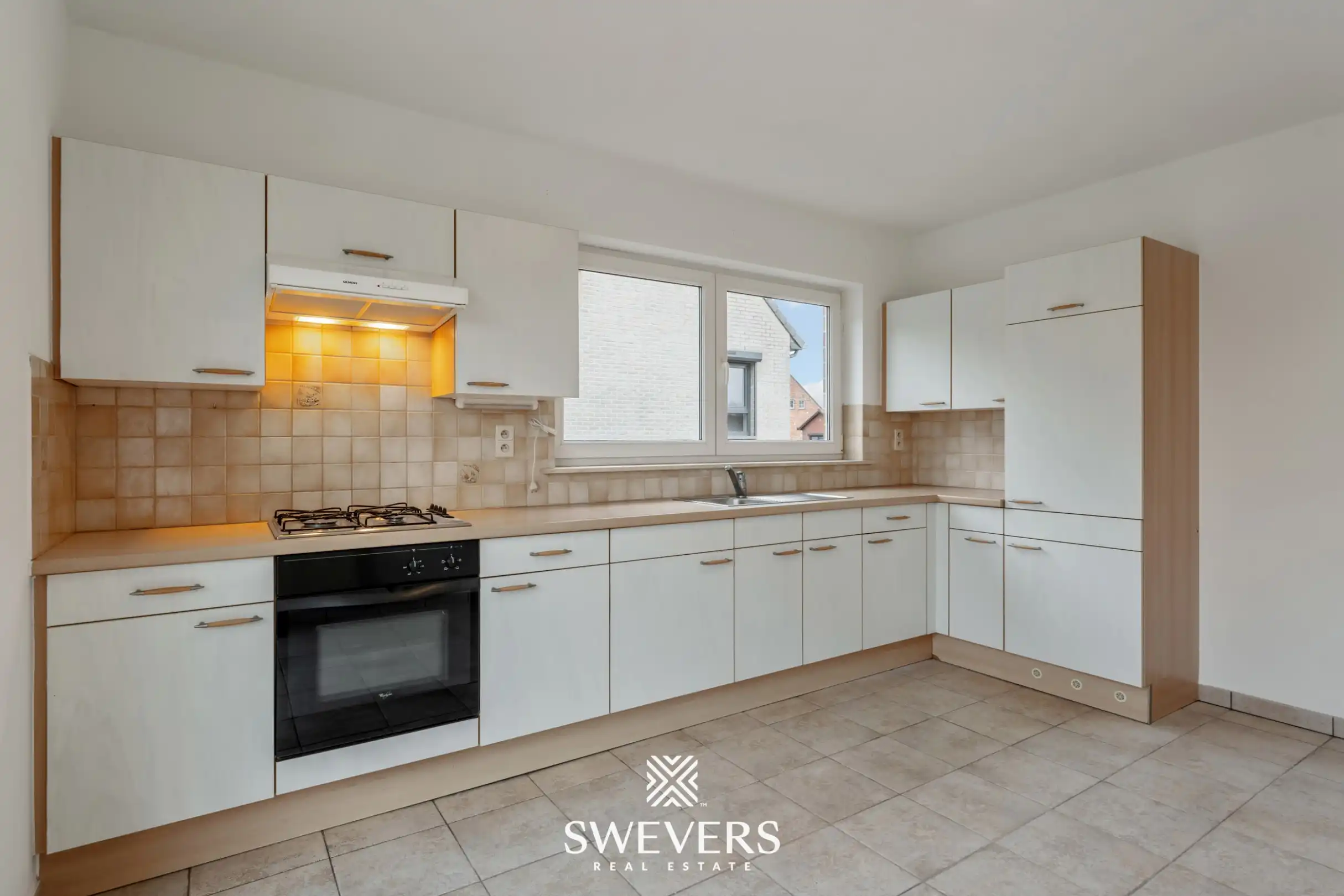 Ruim duplex appartement met 2 slaapkamers, terras en garage in Heusden-Zolder foto 5