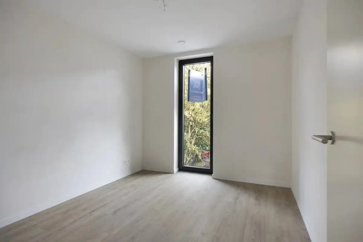 PRACHTIG NIEUWBOUWAPPARTEMENT MET 2 SLPK'S IN CENTRUM HASSELT foto 24
