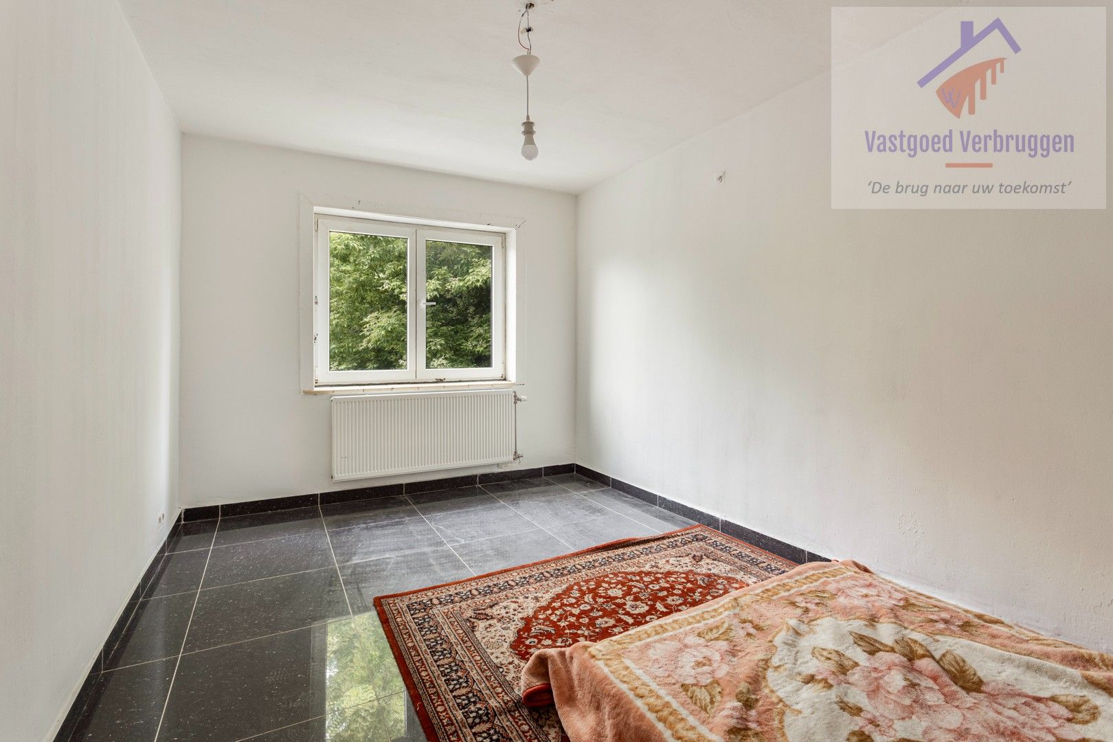 Centraal gelegen ruime woning met 5 slaapkamers, 2 badkamers en tuin! foto 10