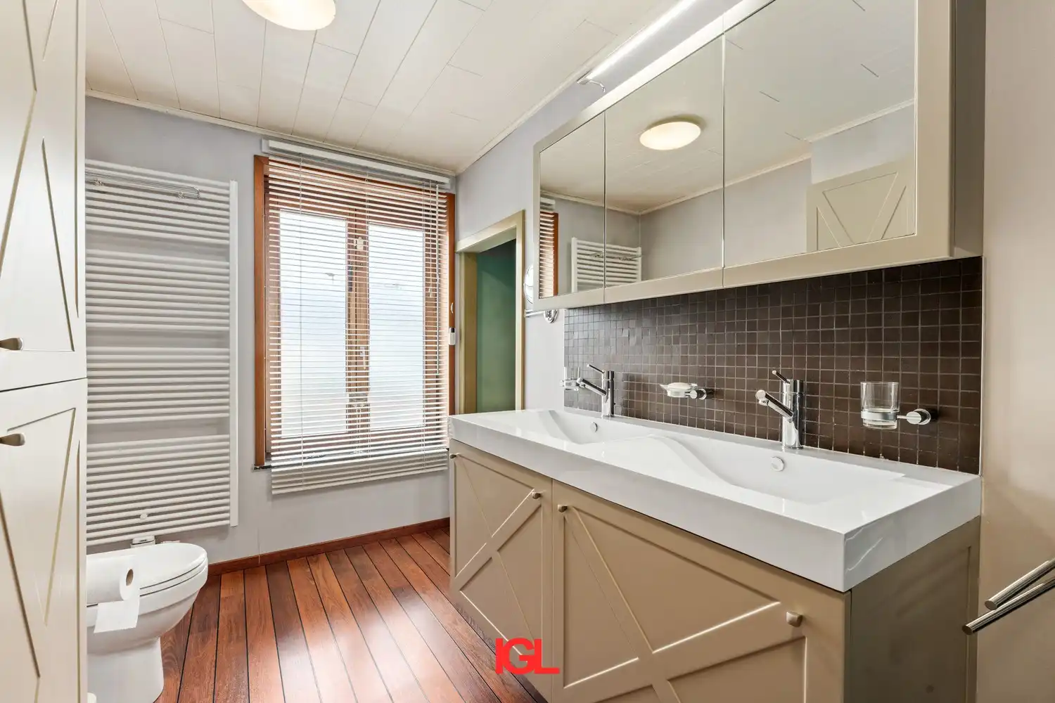 Charmante en instapklare 3‑gevelwoning met grote tuin in Beersel foto 17