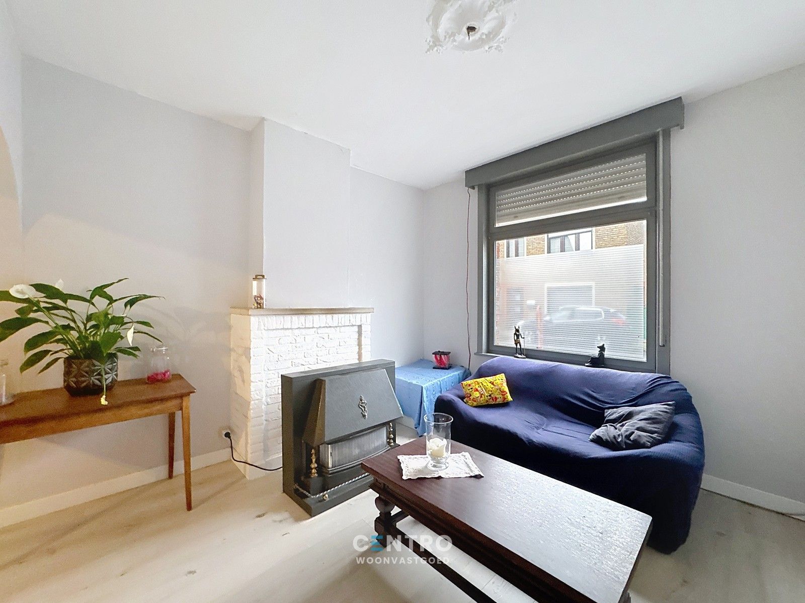 Op te frissen woning met 4 slpks én ZUIDger. tuin te Assebroek! foto 2