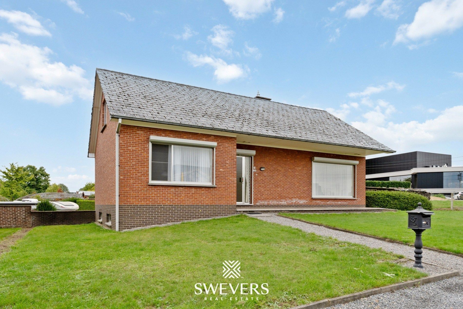 Verzorgde open bebouwing met grote tuin in Borgloon foto 32