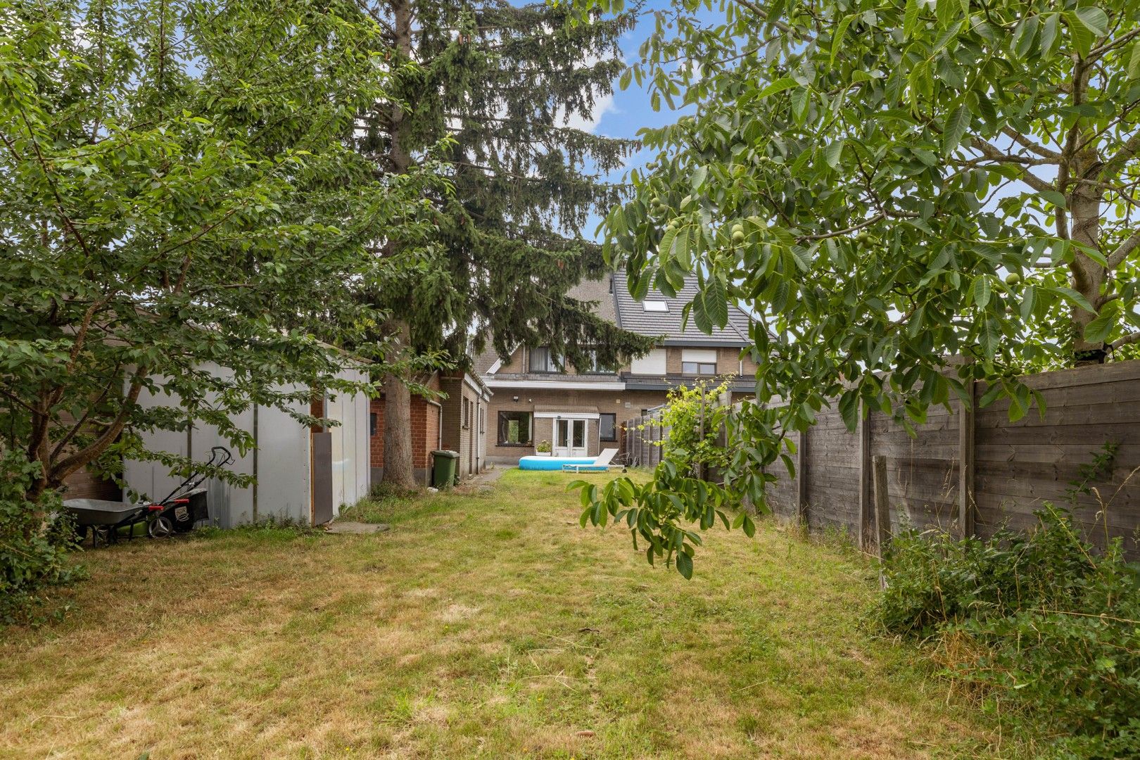 Halfopen gezinswoning in het hart van het landelijke Gontrode, met zicht op agrarisch gebied foto 19