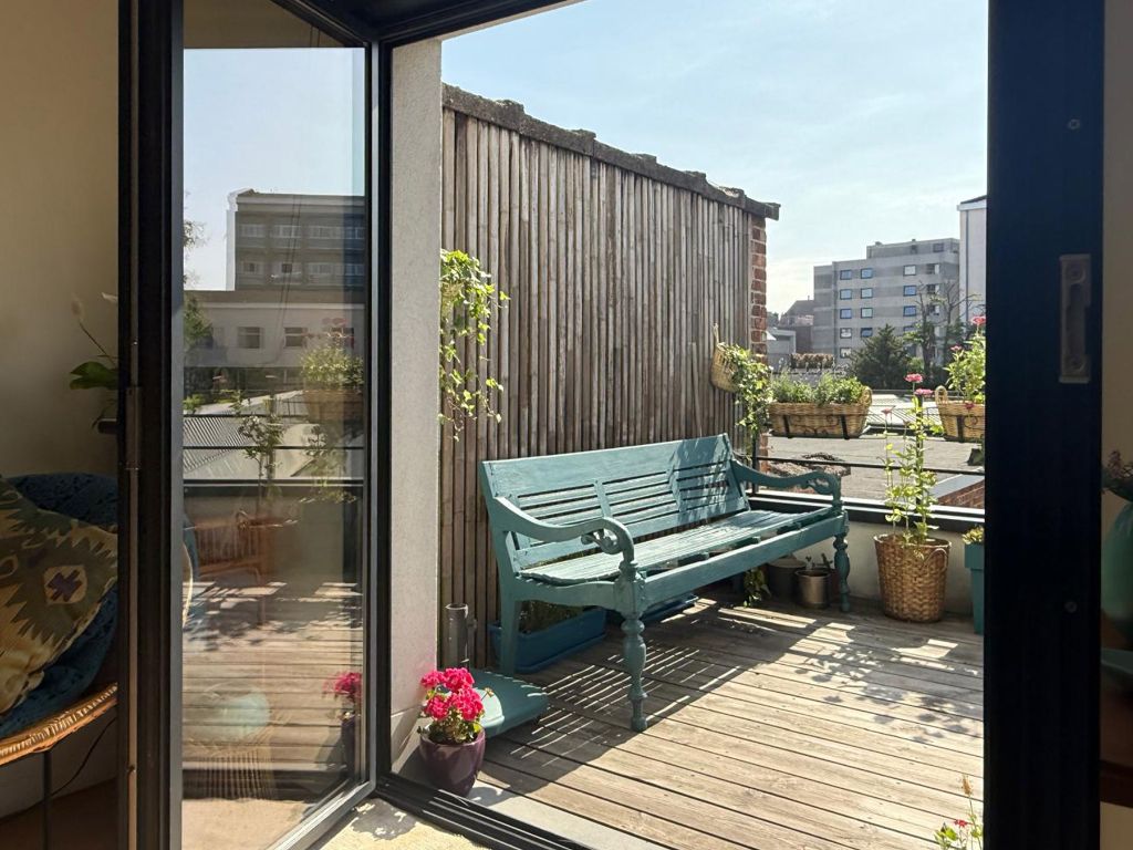Omgeving Sint-Pietersstation. Ruim 2 slaapkamer appartement met aangenaam terras en zicht op groen, zowel aan de voor- als achterzijde foto 16