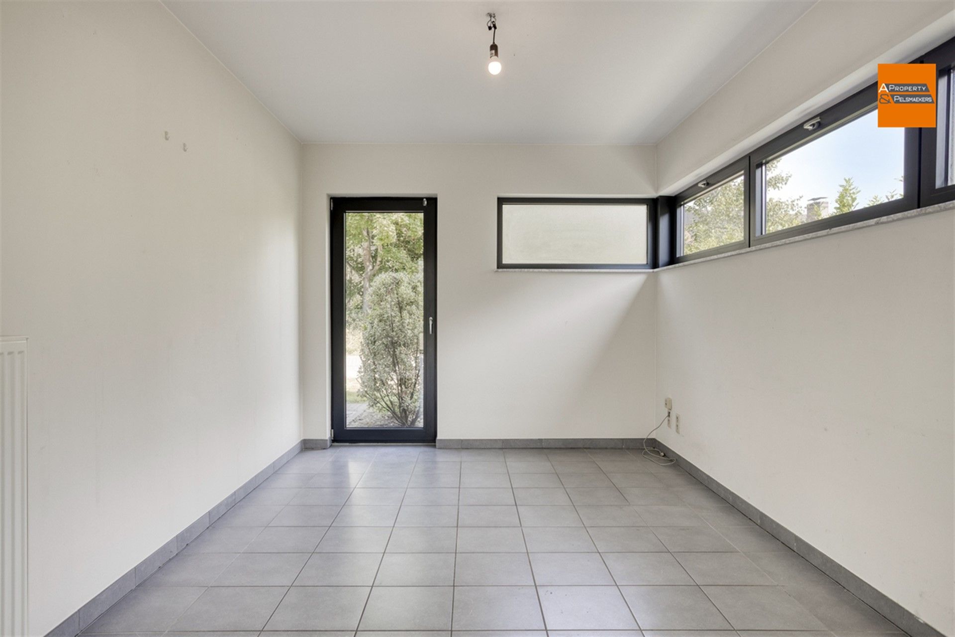 Een stijlvolle villa gelegen in een rustige straat in Kortenberg.

 foto 6