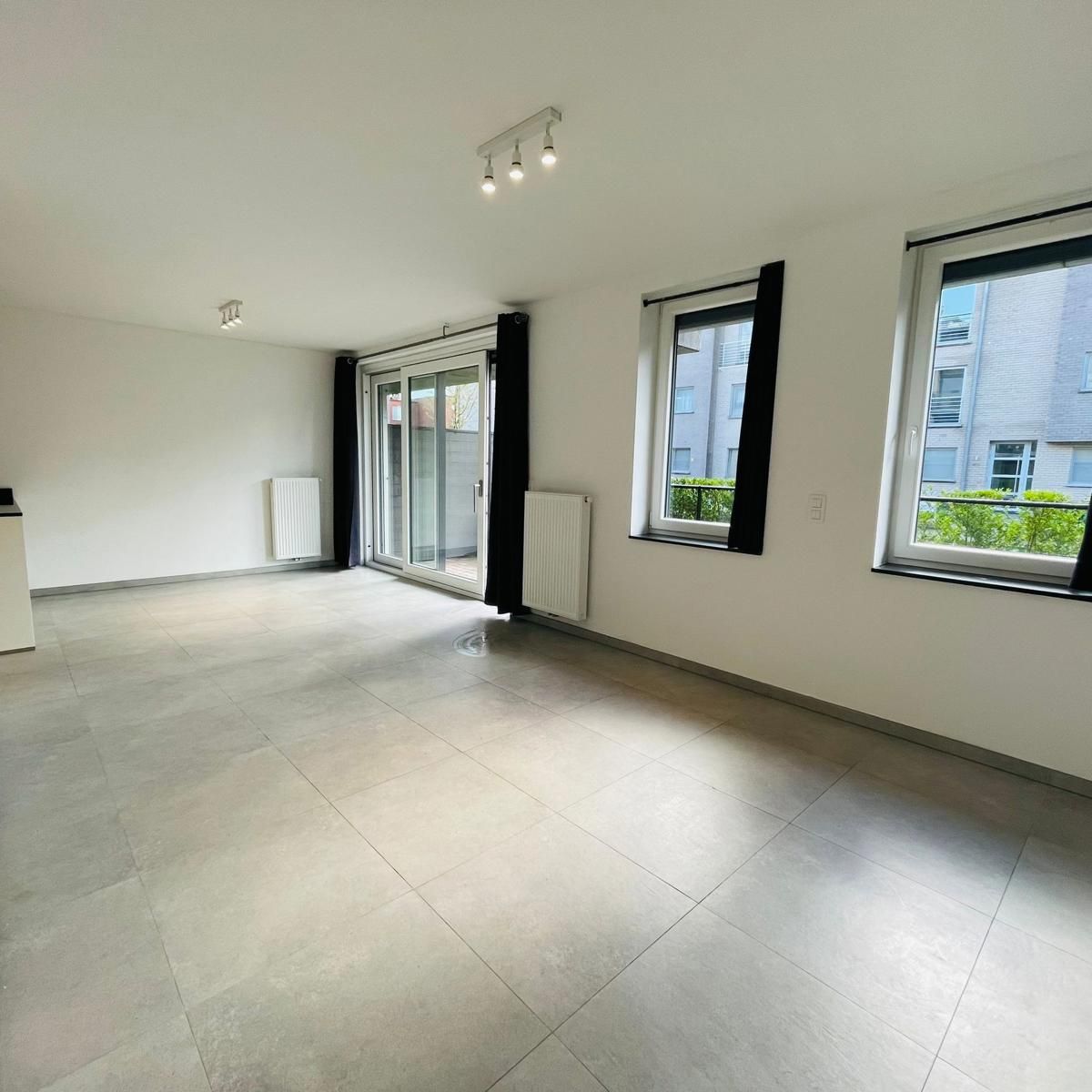 Gelijkvloers 2 slpk-appartement met tuintje foto 10