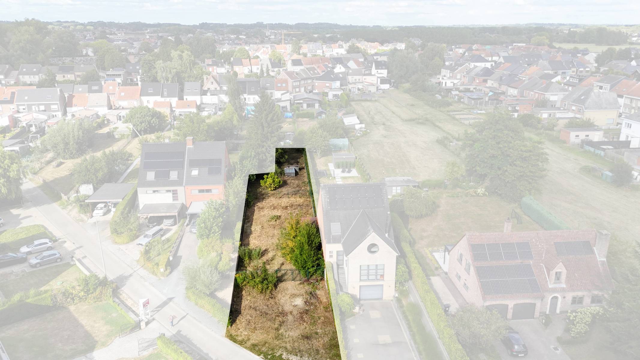 Bouwgrond voor halfopen bebouwing – rustig gelegen (729 m²) foto {{pictureIndex}}