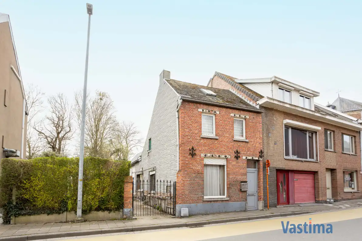 Hoofdfoto van de publicatie: Halfopen woning met uitbreidingsmogelijkheden in hartje Gijzegem