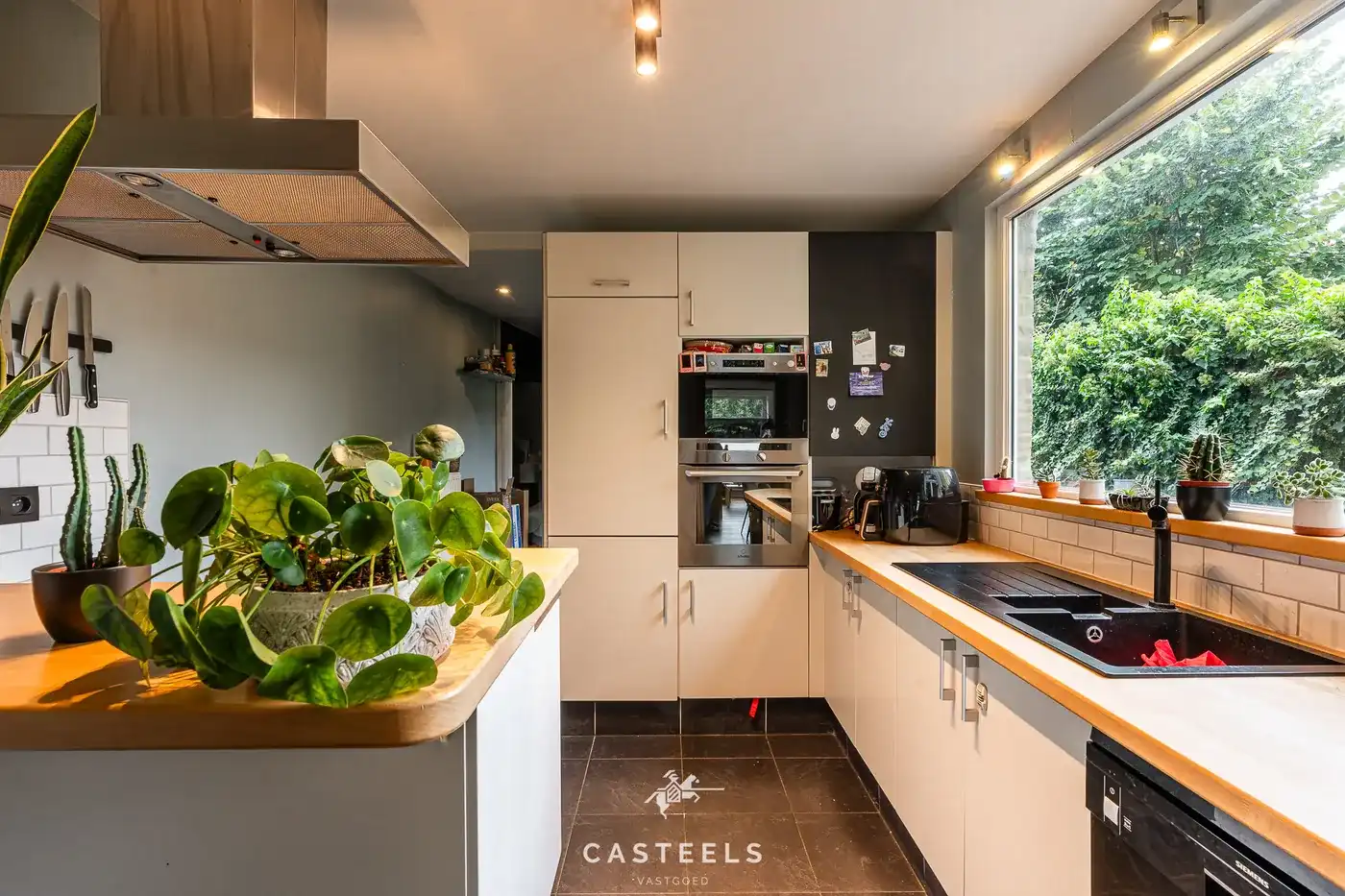 Centraal gelegen rijwoning met tuin in Sint-Denijs-Westrem foto 13