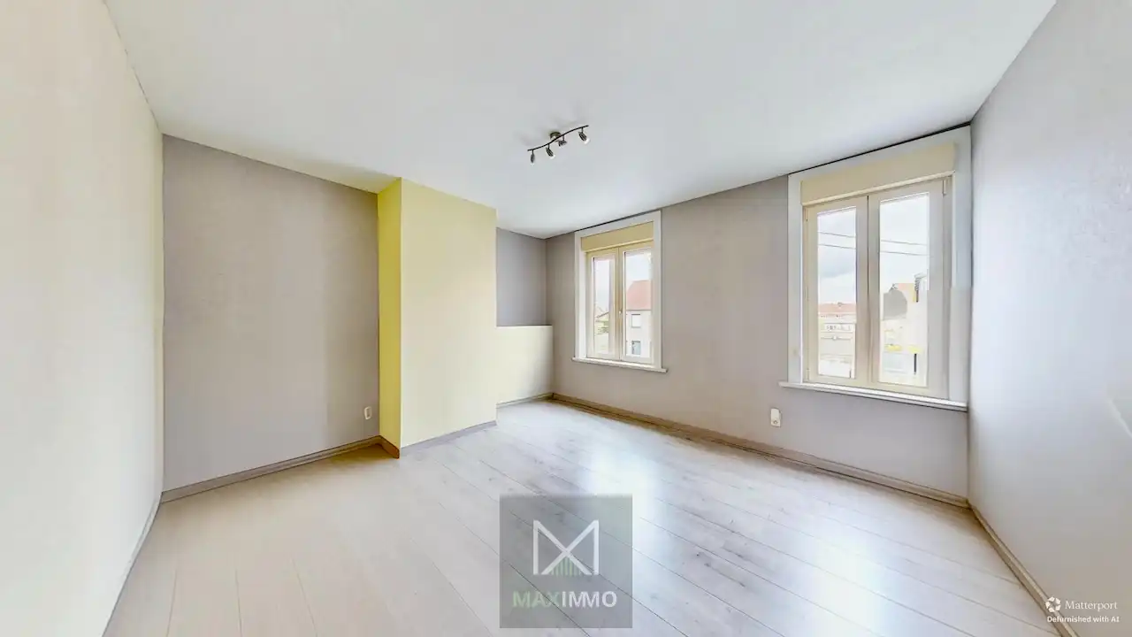 Instapklare, lichtrijke gezinswoning met grote tuin te Menen foto 9