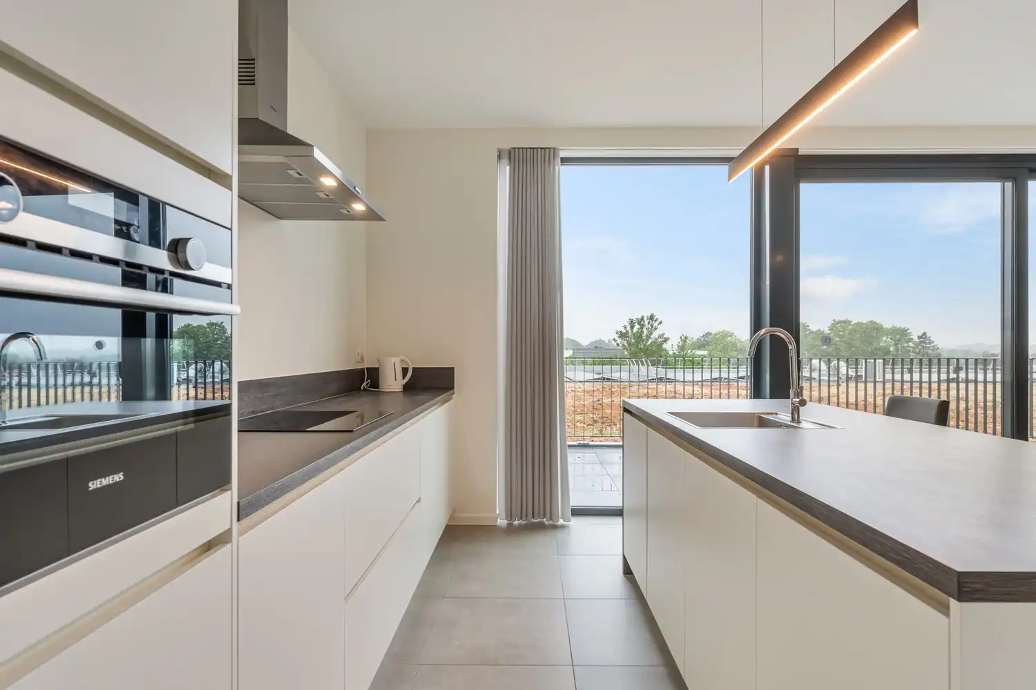 Recent en energiezuinig(A-label) appartement met 2 slaapkamers, 2 autostaanplaatsen, een ruim terras en een private berging te Korbeek-Lo! foto 13