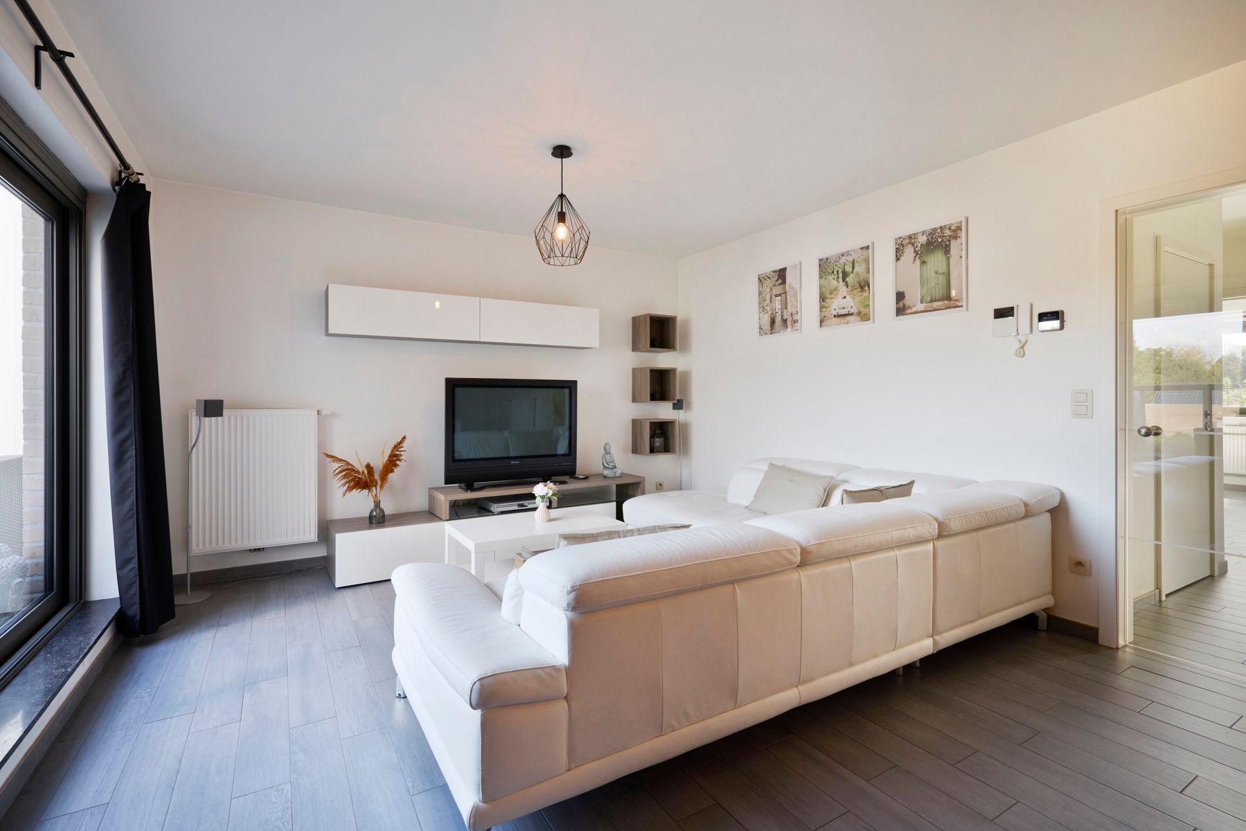 Klassevol 2 slaapkamerappartement met garage foto 7