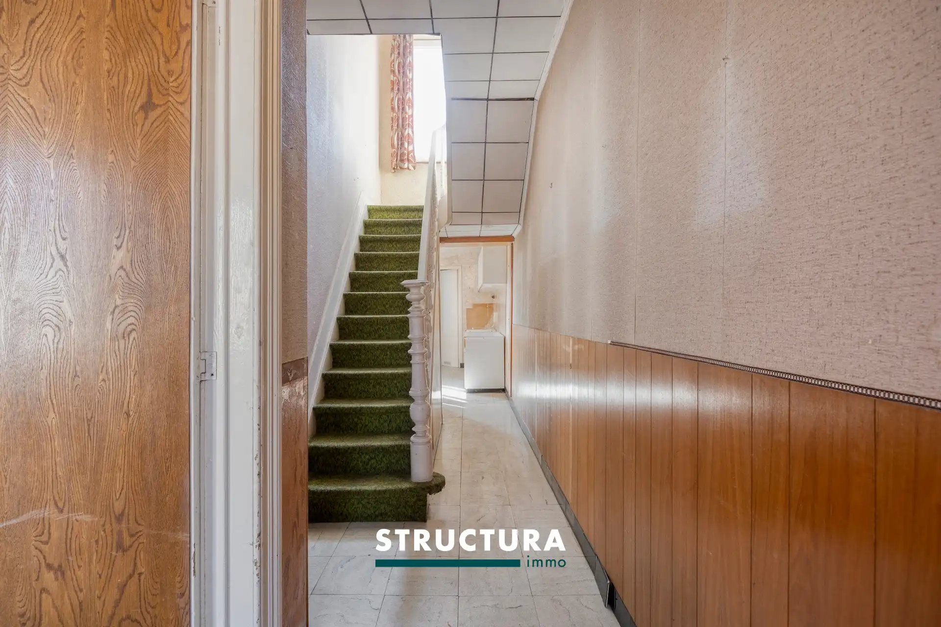 Centraal gelegen renovatiewoning met tuin foto 2