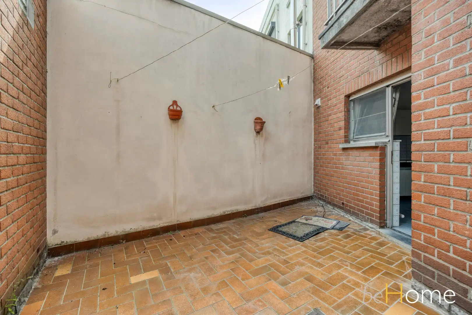 Opbrengsteigendom met 5 appartementen en 2 garages op toplocatie in Merchtem foto 13