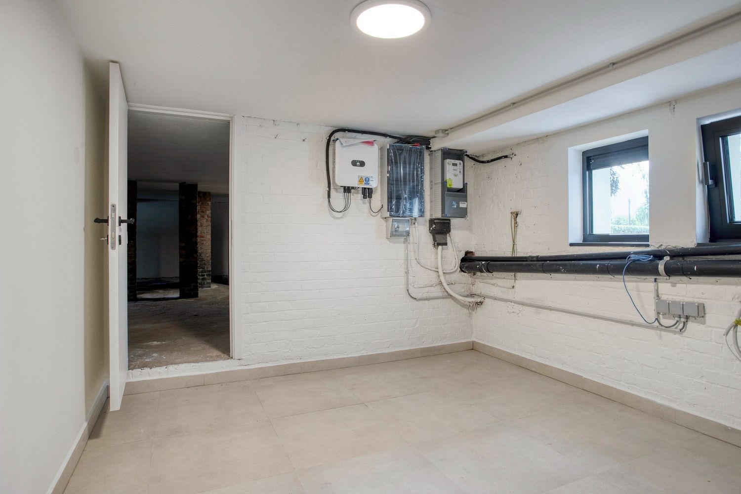 Prachtig gerenoveerde interbellum BEN-woning met diepe, zonnige tuin te Afsnee foto 18