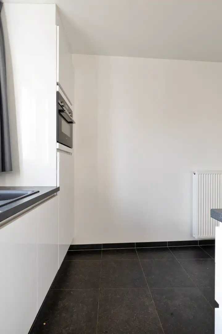 Recent appartement met 2 slaapkamers, terras, 2 ondergrondse autostaanplaatsen en private kelderberging in Herent! - EPC 41 kWh/m² - bewoonbare opp. 86 m² foto 11