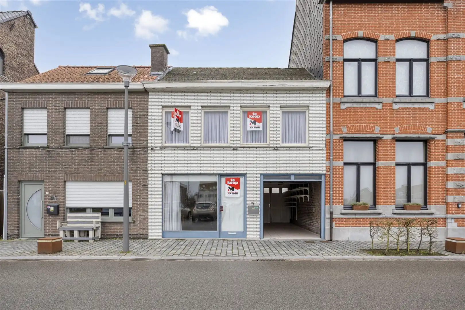Te renoveren woning gelegen aan het plein in Kaprijke ! foto 7