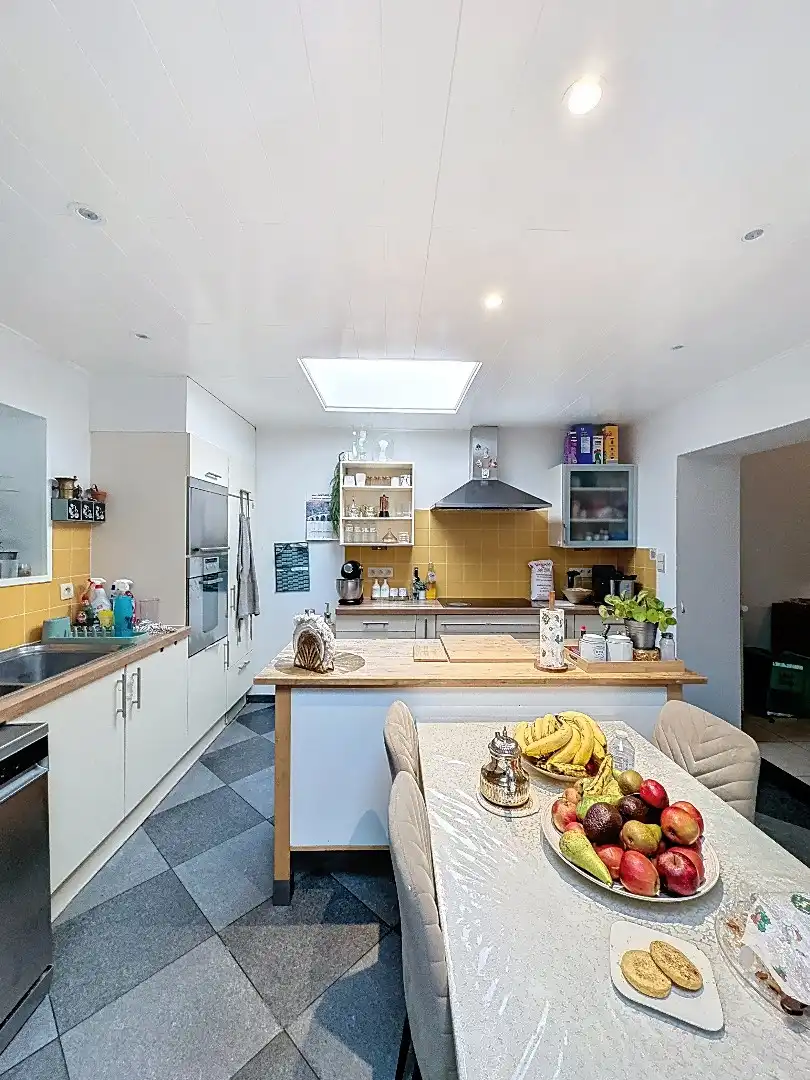 Volledig gerenoveerde,  centraal gelegen rijwoning in Tienen met tuin, terras en 3 slaapkamers foto 7