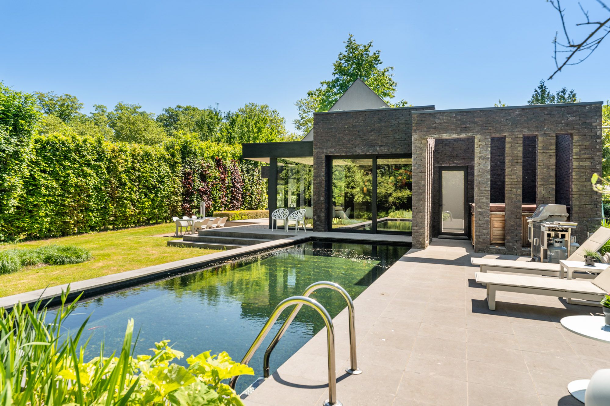 Exclusieve villa met tijdloze klasse, zwemvijver en zicht op groen te Hasselt ! foto 31