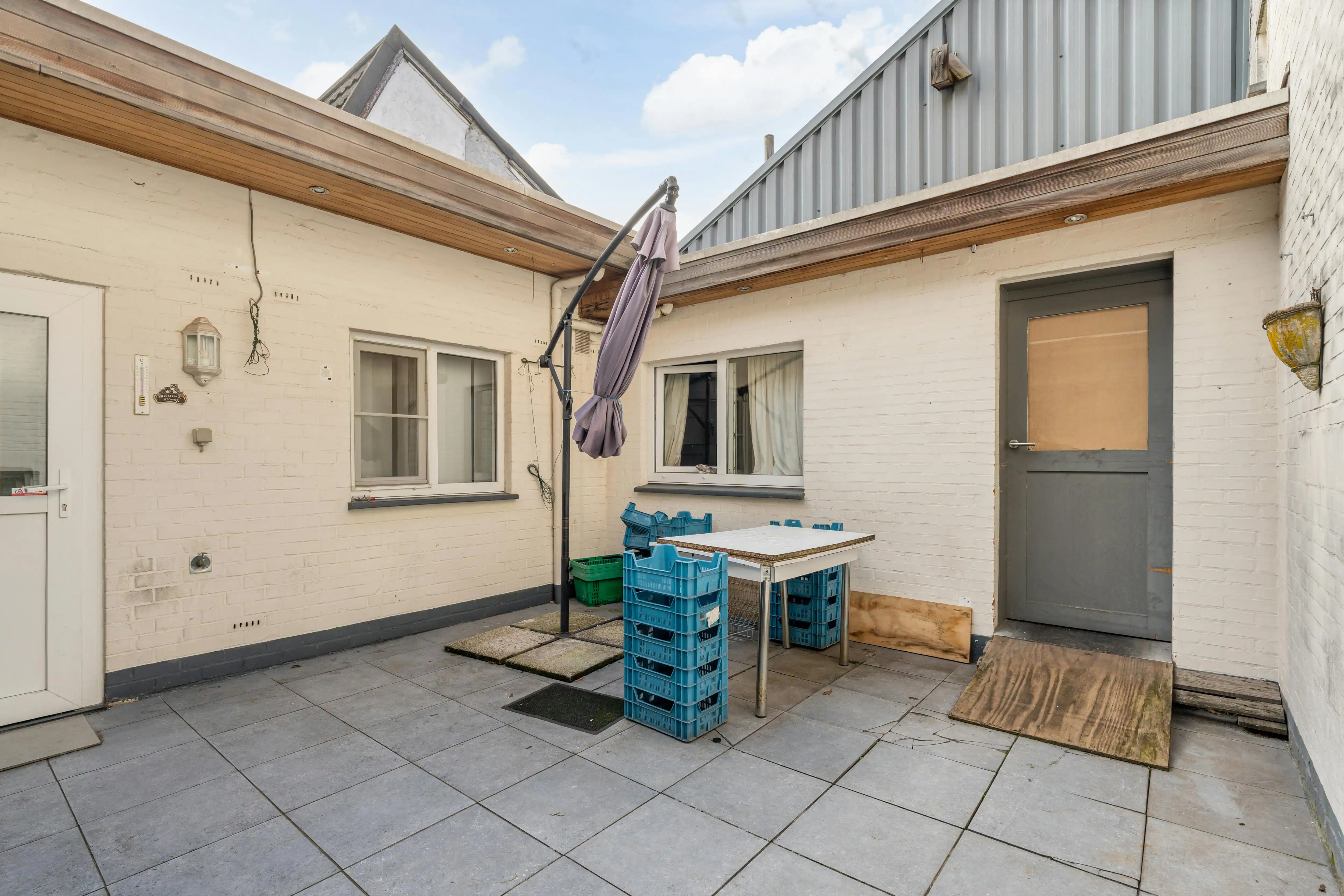 Rendabele opbrengsteigendom met handelspand, magazijn, woonst en 2 appartementen in Genk foto 23