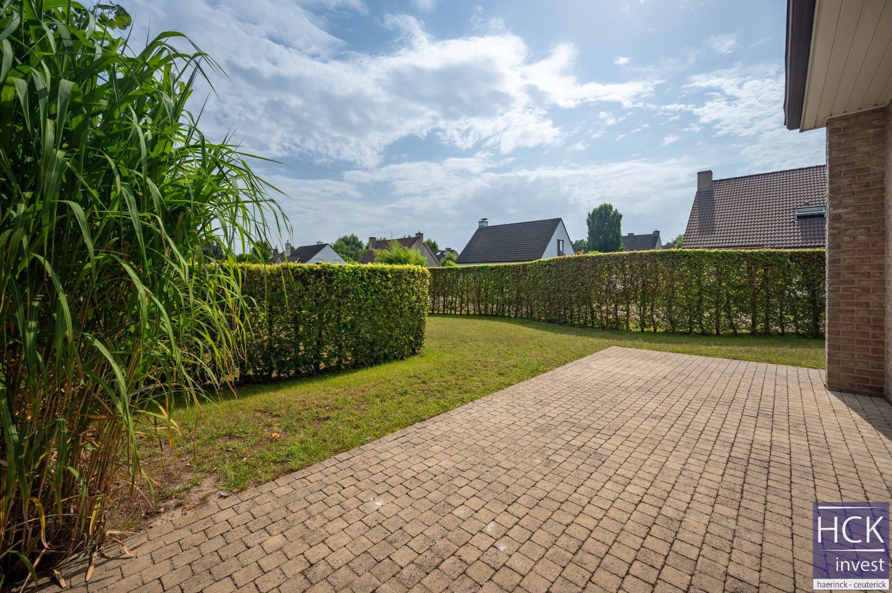 KRUISHOUTEM - Instapklare woning met 3 SLPK. én zongerichte tuin foto 11