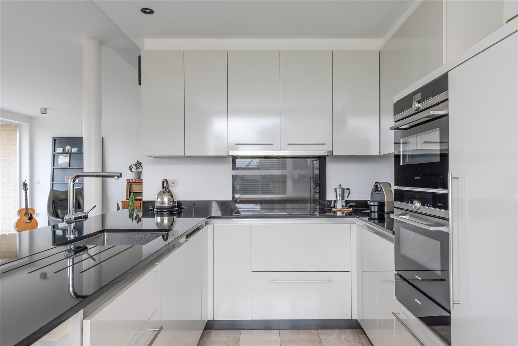 Lichtrijke woning met zuidelijk georiënteerde tuin foto 9