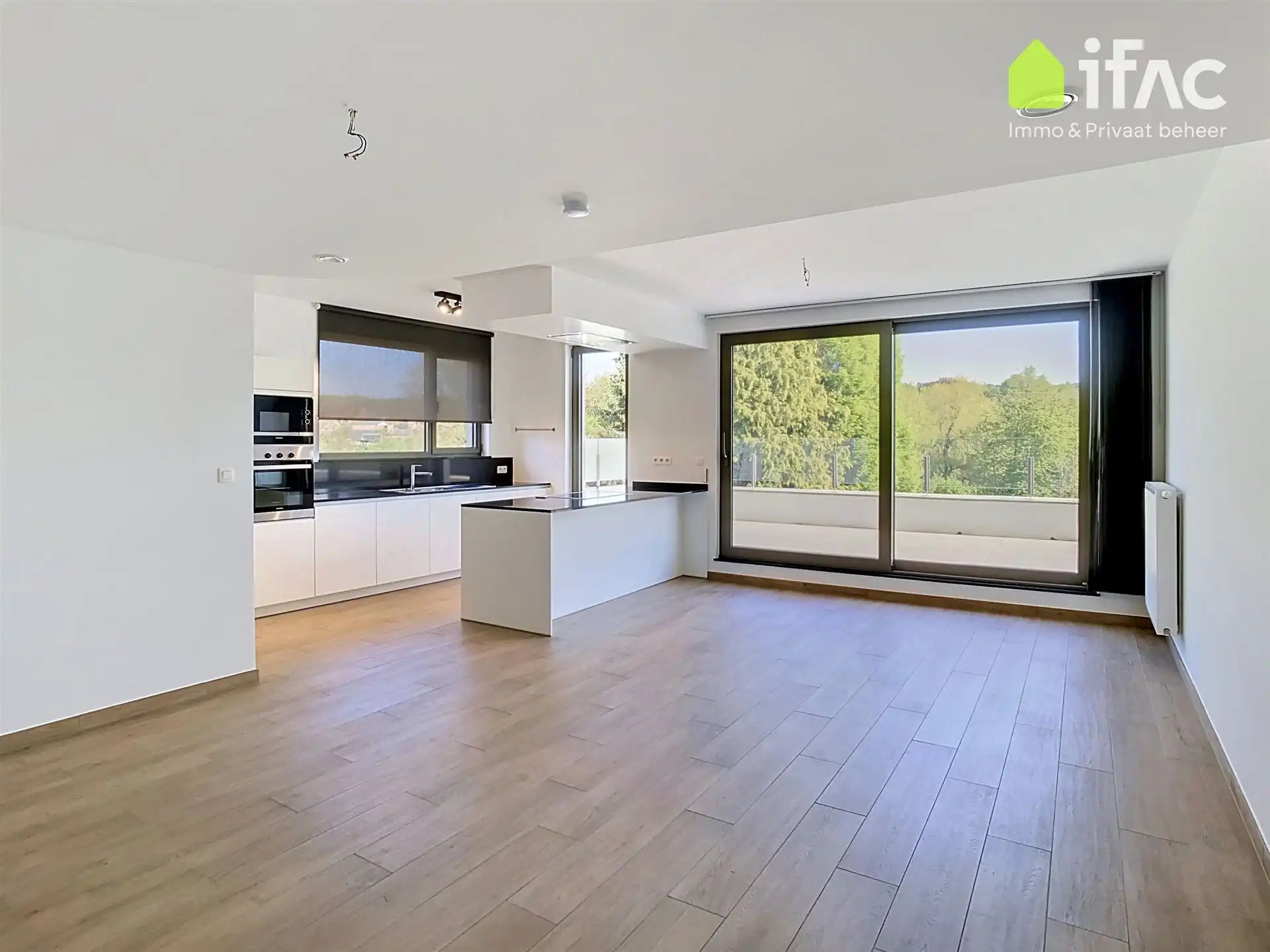 Modern appartement met prachtig terras en dubbele garagebox foto {{pictureIndex}}
