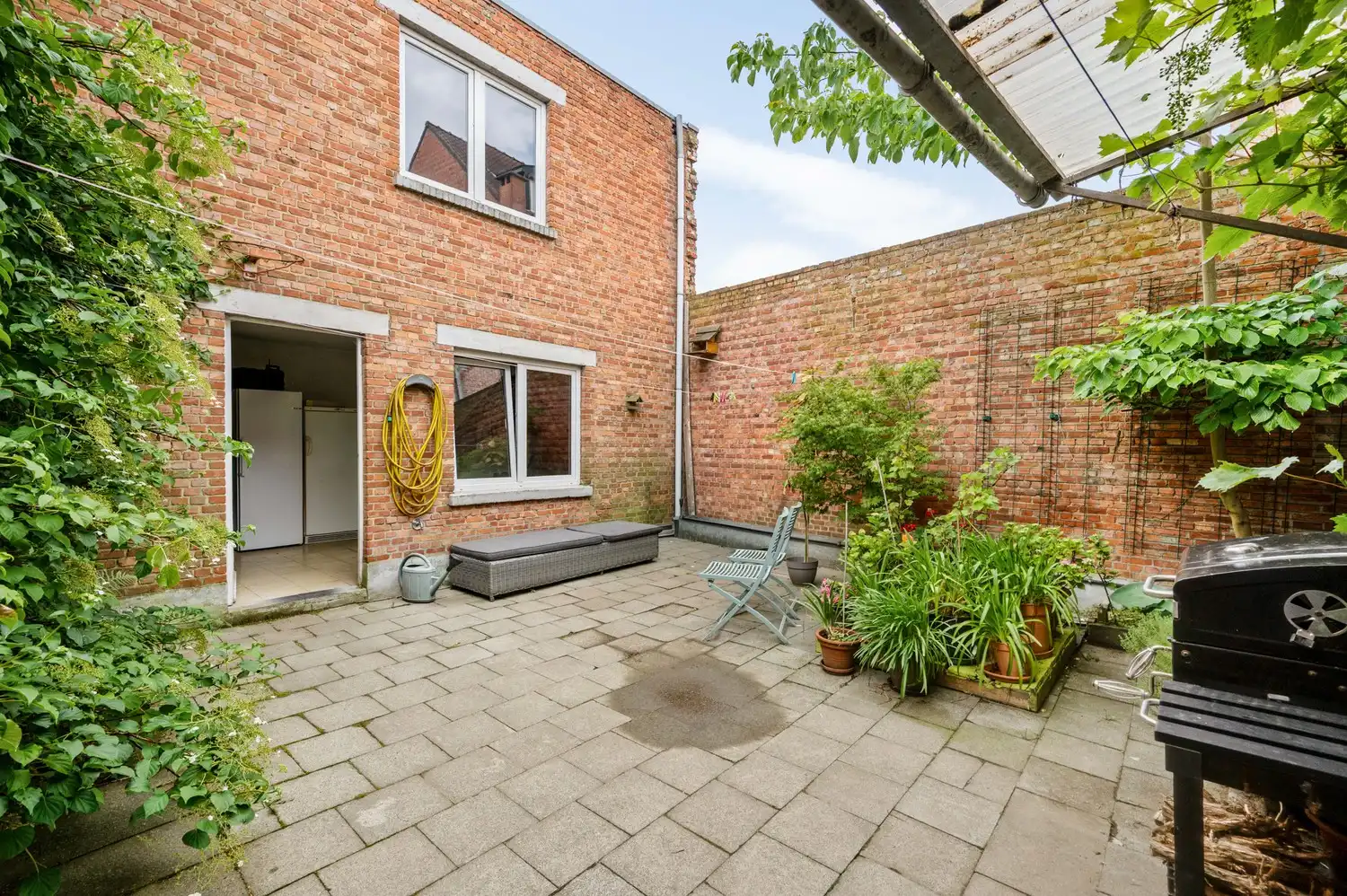 Instapklare woning met 4 slpkrs met gezellige stadstuin en garage foto 20