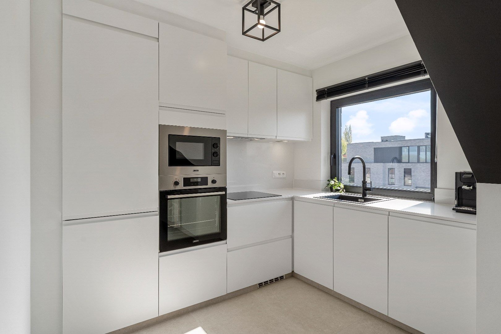 Leuk appartement met 2 slaapkamers, hoogwaardige afwerking en parkeerplaats op wandelafstand van het centrum foto 3