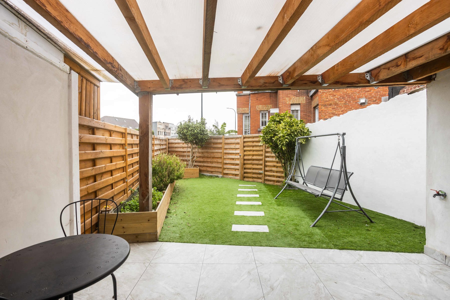 Gerenoveerde stadswoning met tuin en 3 SLP foto 22