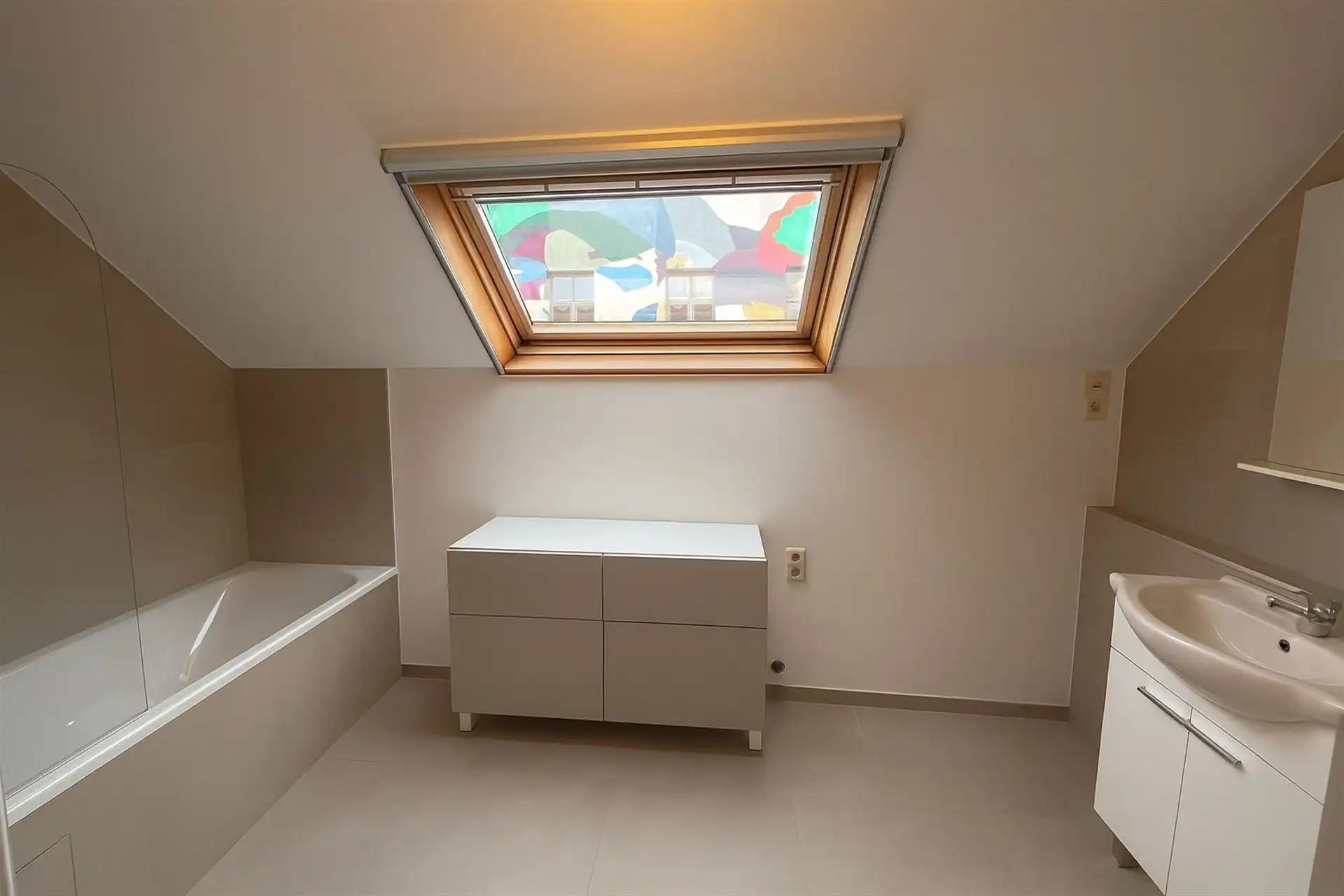 Centraal gelegen stadswoning met 2 slaapkamers, garage en terras foto 9