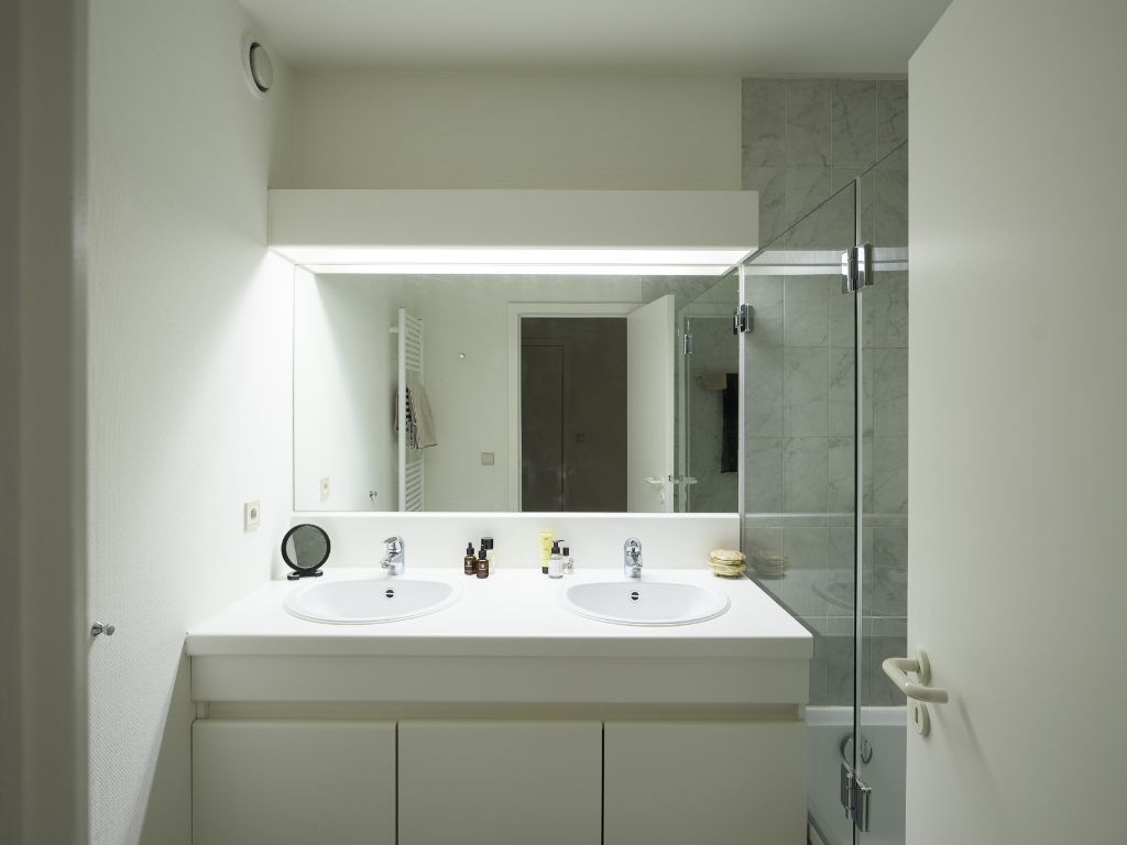 Licht op te frissen penthouse met 4 slaapkamers, meerdere zonneterrassen en een adembenemend uitzicht over de Leie en de Bijloke. Aankoop staanplaats. foto 21