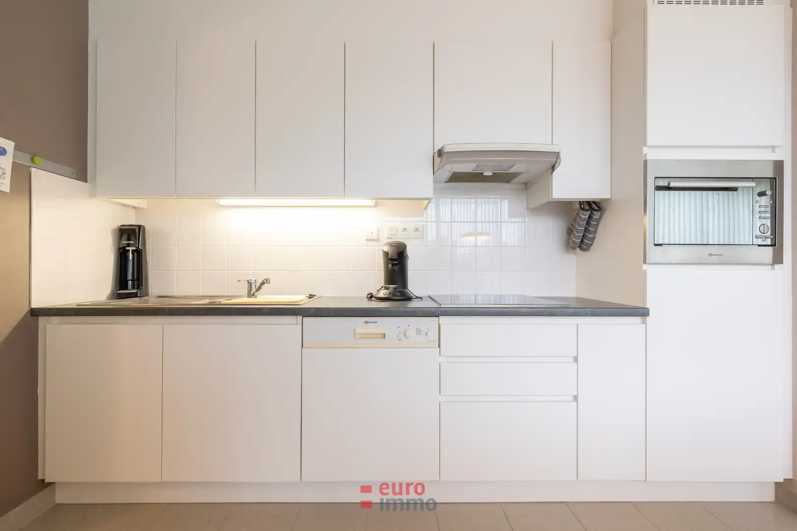 Uitermate lichtrijke penthouse midden in de winkelstraat! foto 8