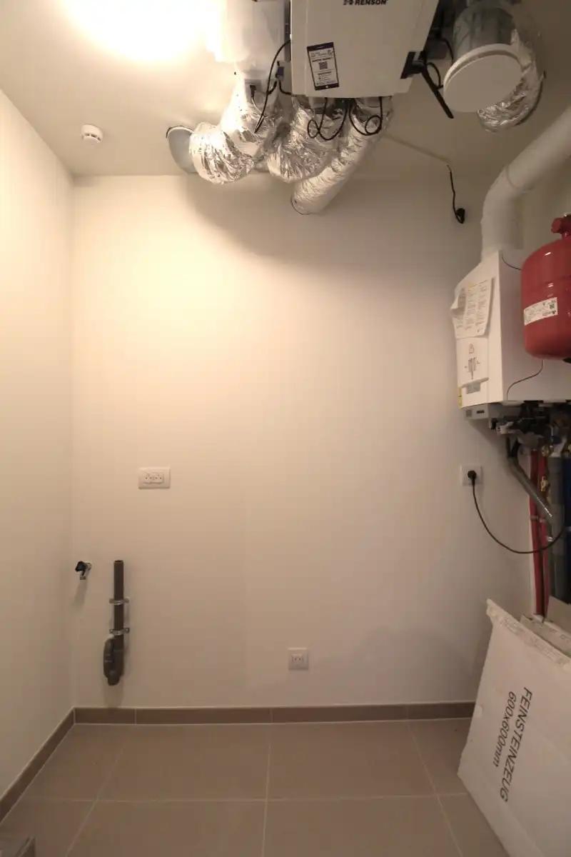 Gelijkvloers nieuwbouwappartement met tuin in centrum Tielt foto 6