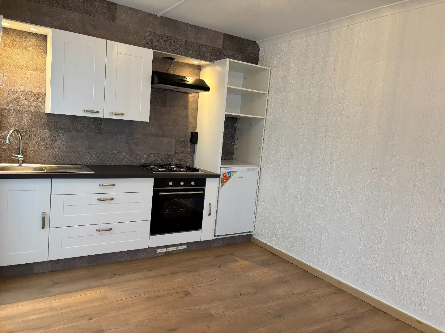 Gerenoveerde woning met garage nabij het centrum! foto 6