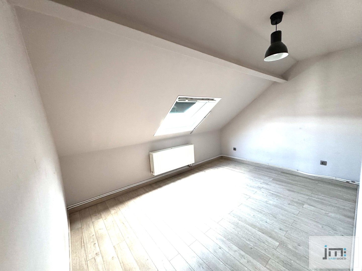 Ruime open bebouwing met tuin en garage foto 8