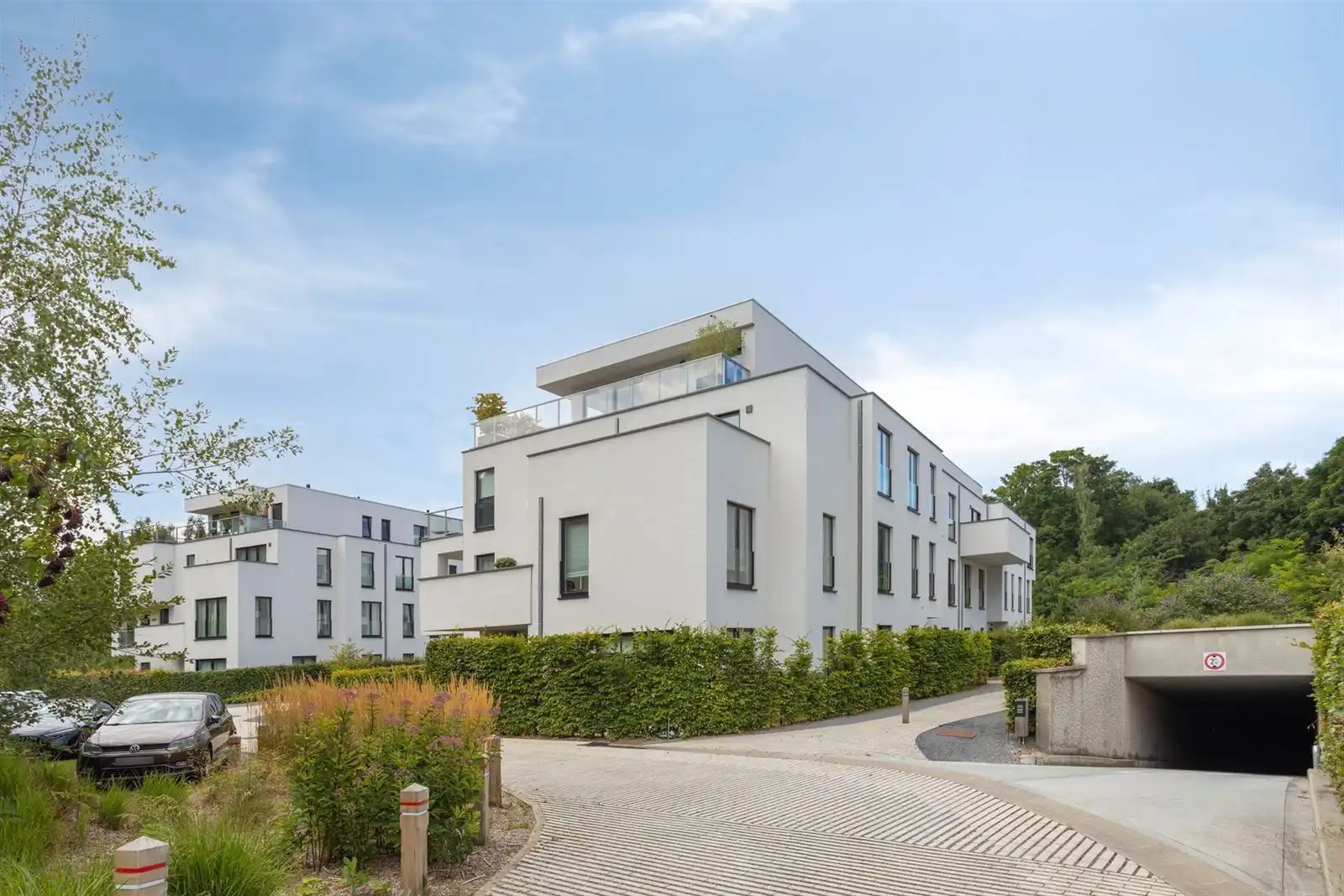 Prachtig recent gelijkvloers appartement met 2 slaapkamers, tuin en parking foto 27
