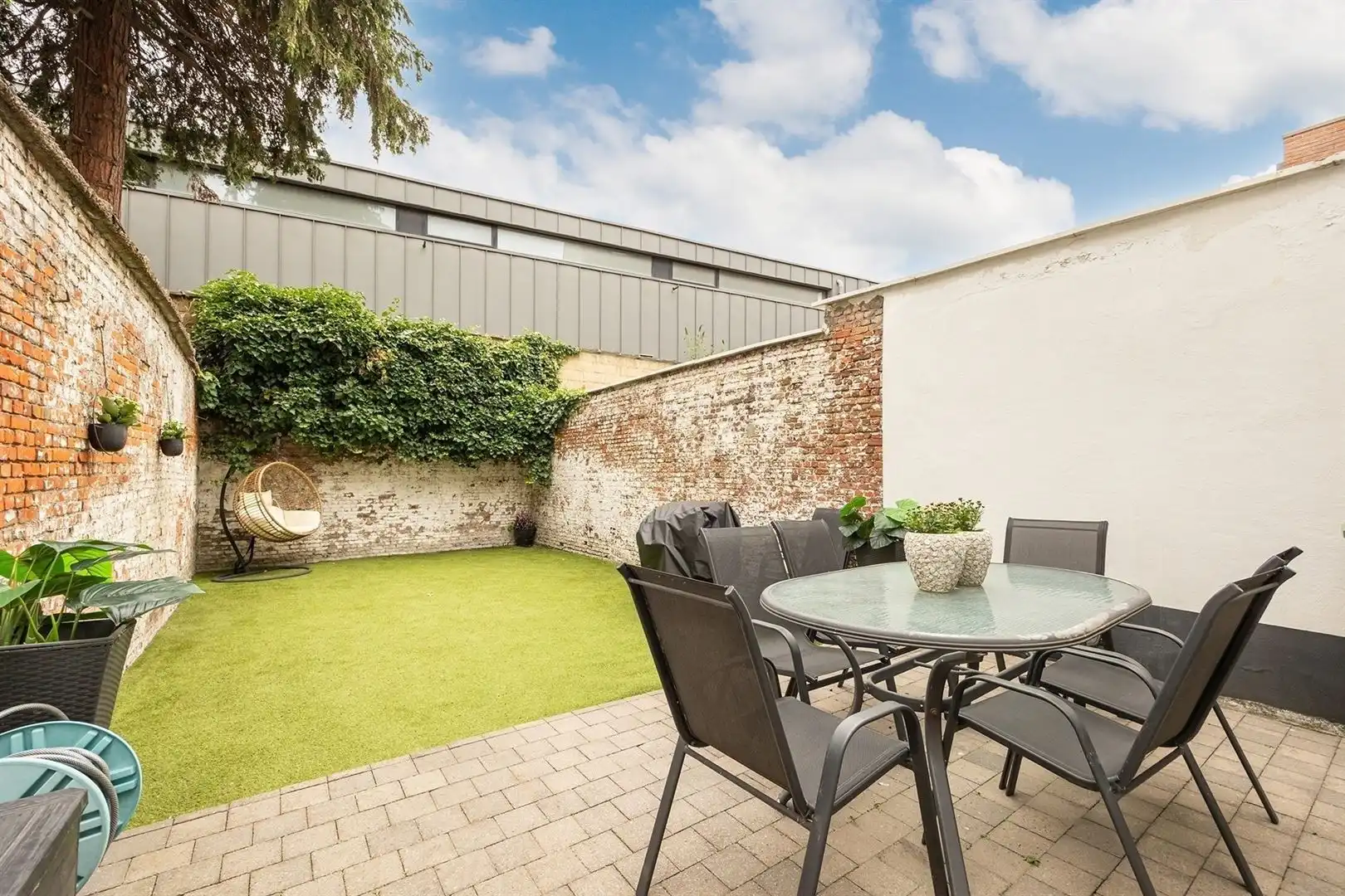 Stadswoning met privatieve tuin & garage foto 3