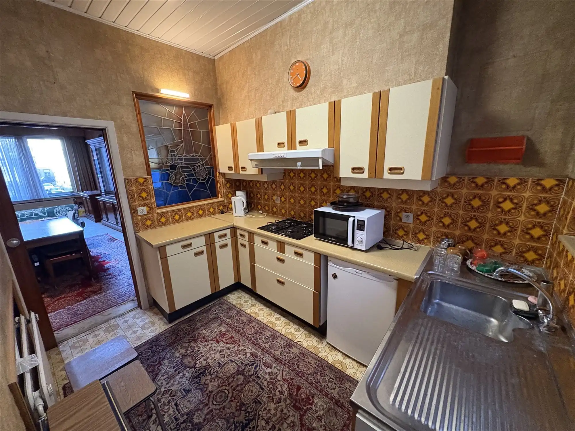 Bel-etagewoning met garage aan Sint-Andriesplaats. foto 8