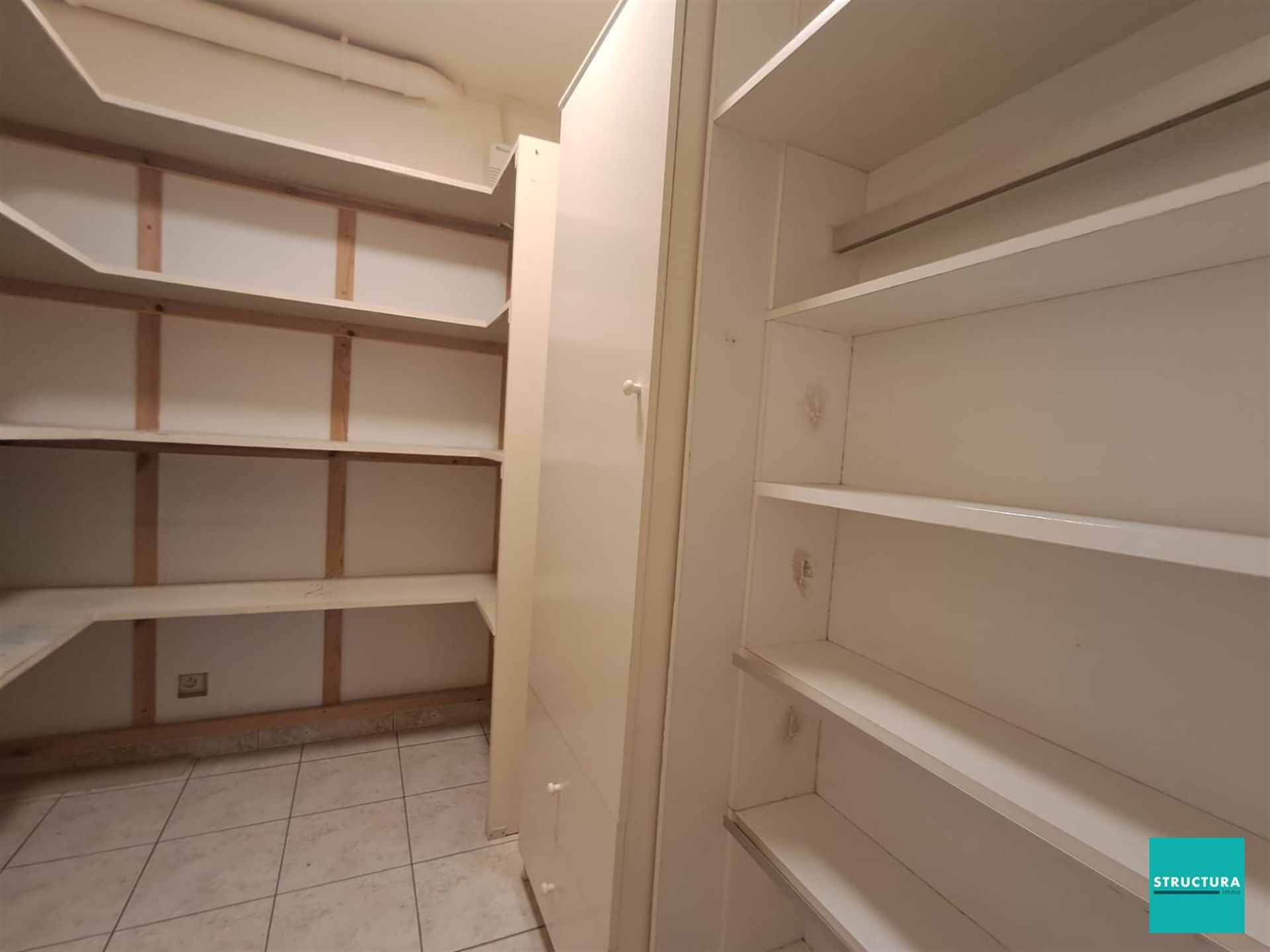 Ruim penthouse met drie slaapkamers, kelderberging en garage op toplocatie. foto 18