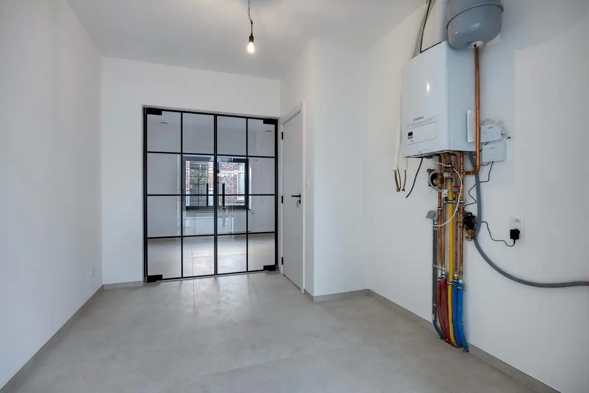 Volledig gerenoveerde woning met 3 slaapkamers, badkamers en tuin in Tienen! – EPC A - bewoonbare opp. 130 m² foto 9