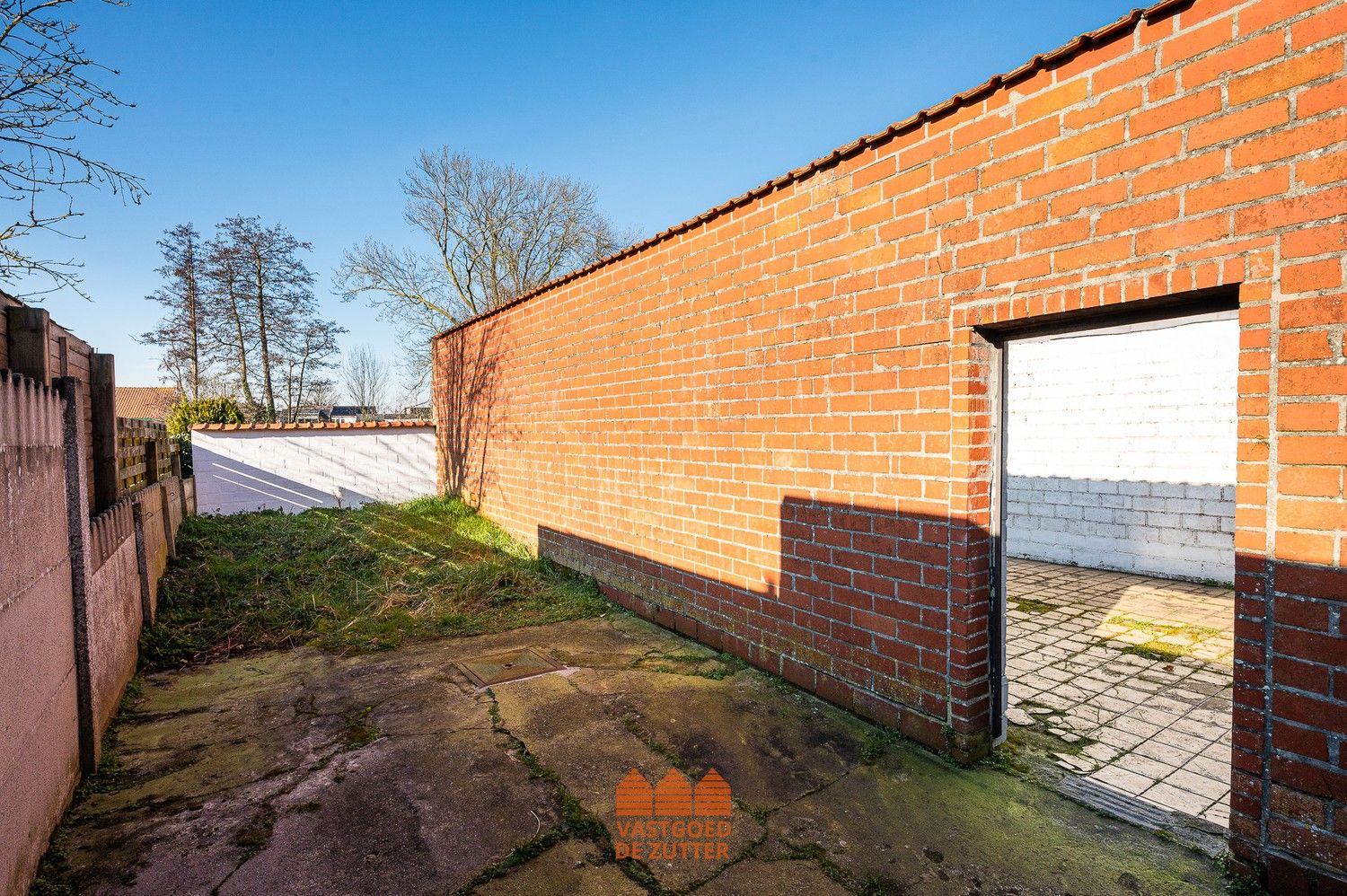 Ruime woning met handelspand in het centrum van Boekhoute foto 17