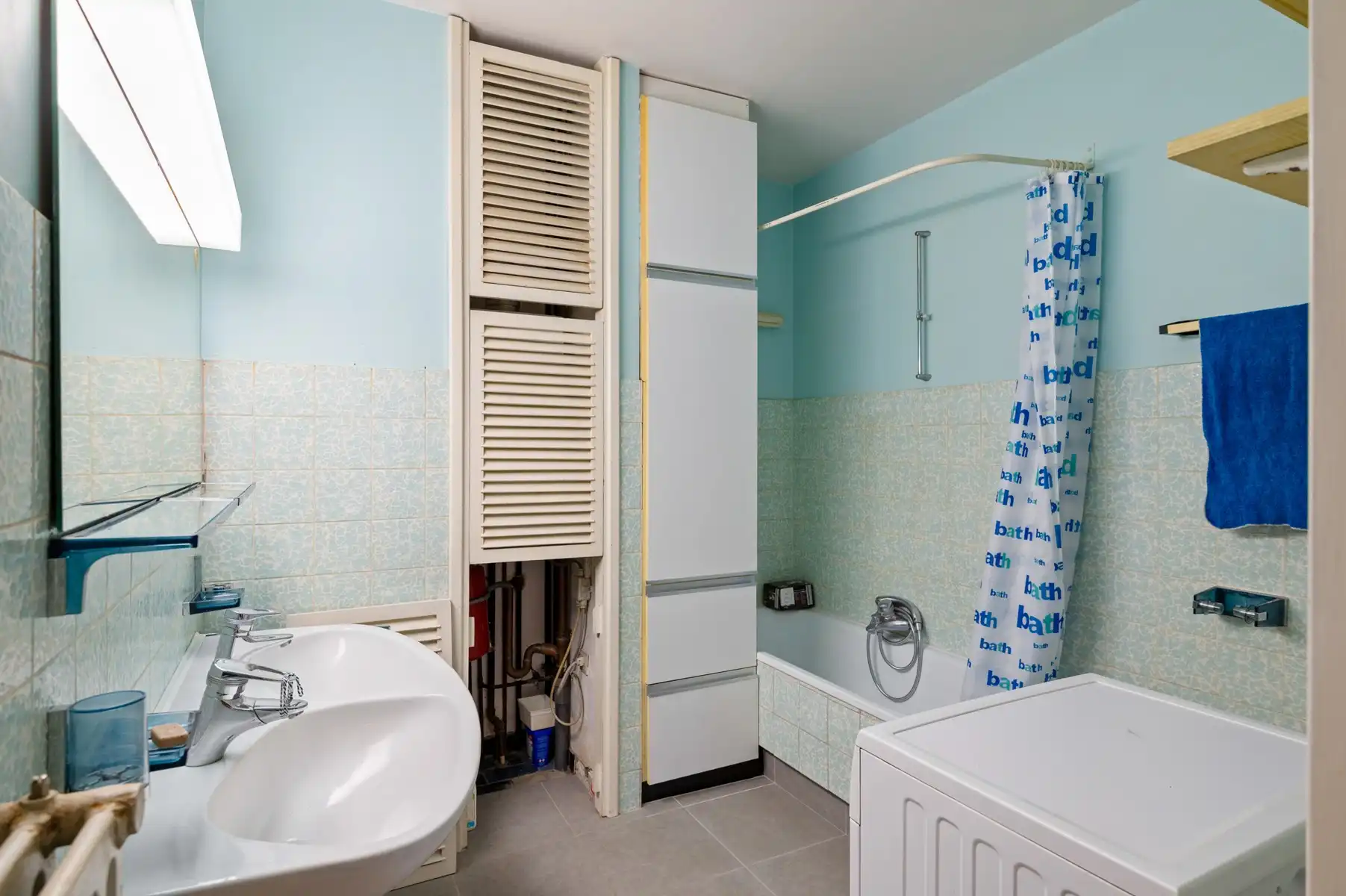 Te renoveren appartement met garage op uitstekende ligging foto 15