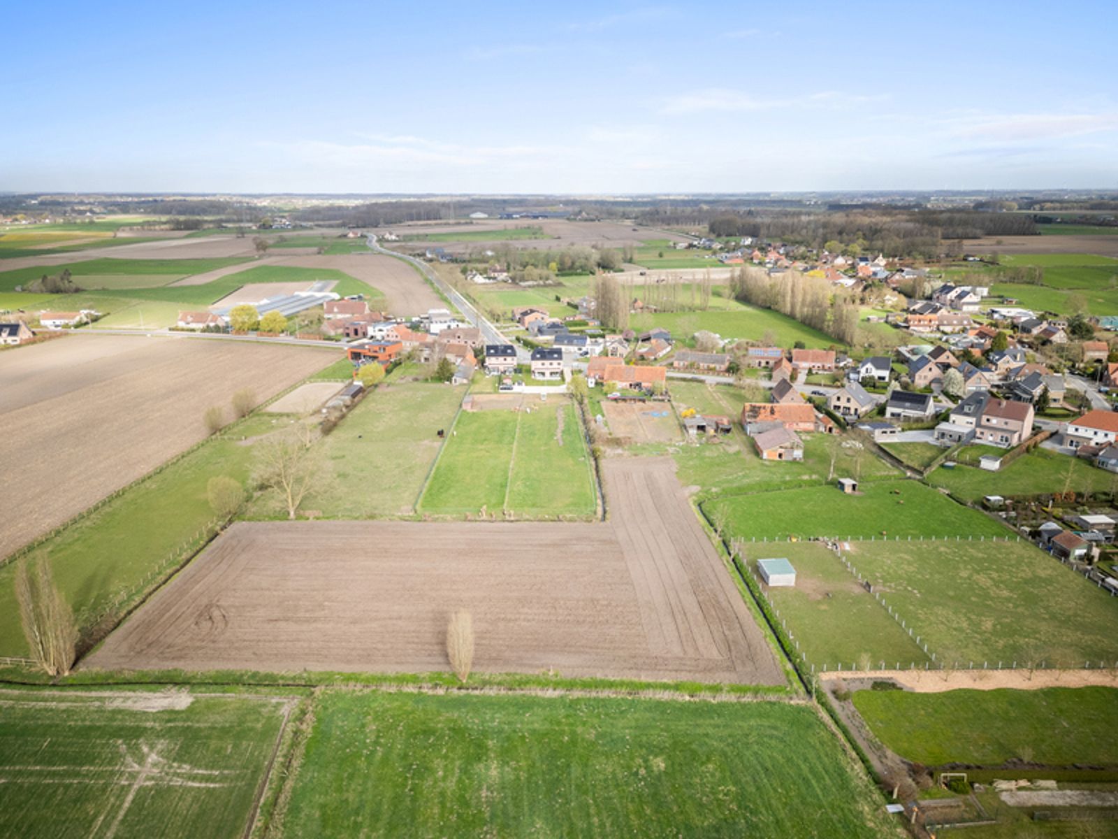 Hoeve met bijgebouwen op circa 1,2 ha foto 11