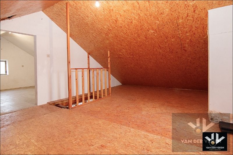 Multifunctioneel eigendom met 2 wooneenheden op een riant perceel van 21 aren 83 centiaren op een goed bereikbare, rustige locatie in Diepenbeek foto 26