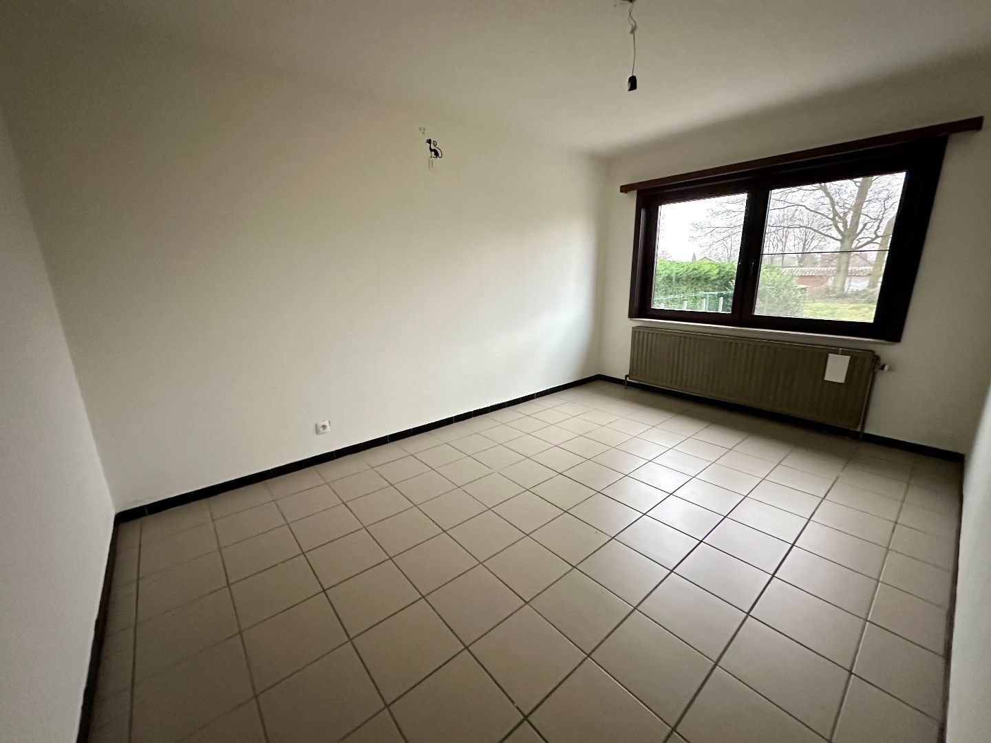 Halfopen woning met ruime tuin foto 12